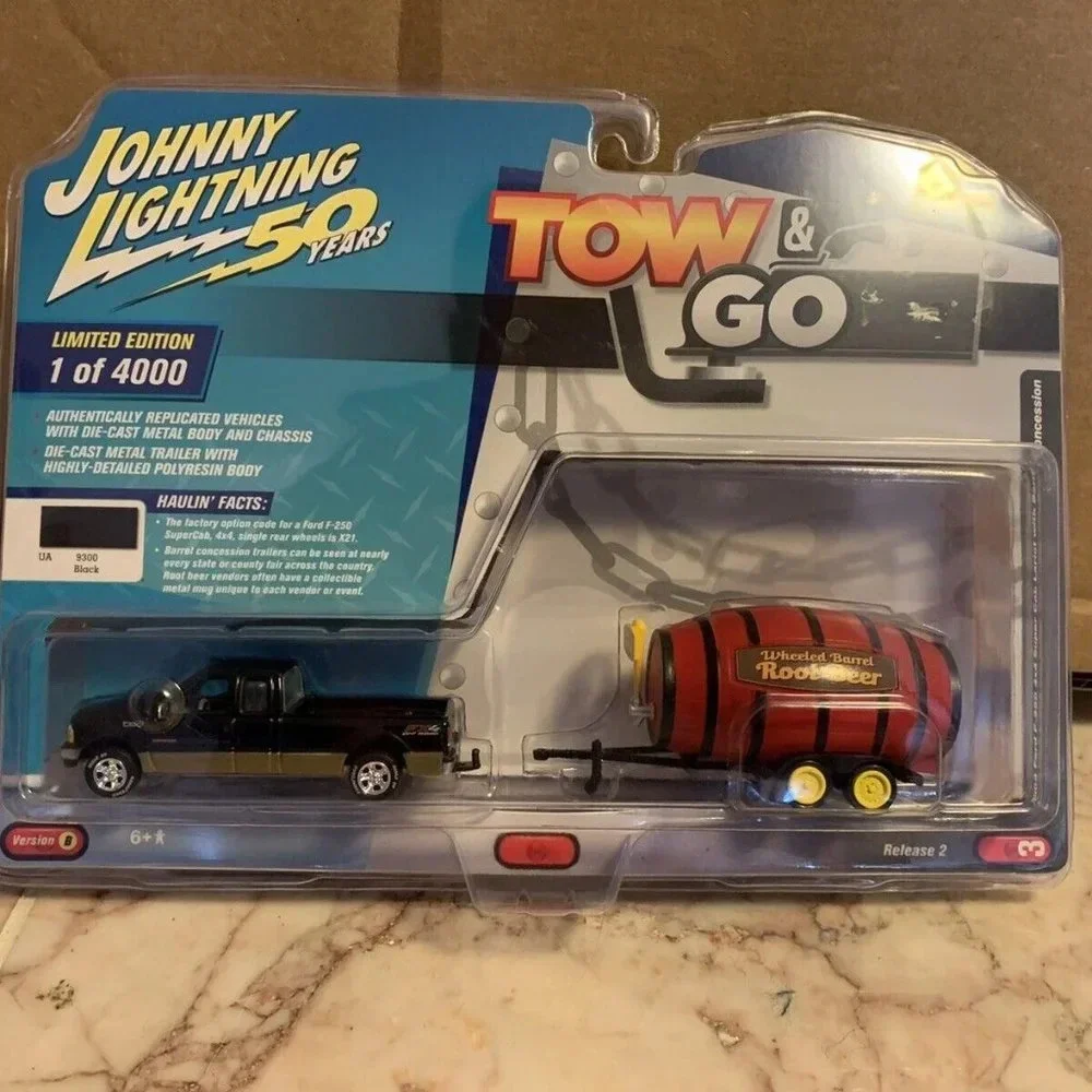 Johnny Lightnings Tow & Go 2003 Ford F-250 + Barrel Concessions Limited 1/4000